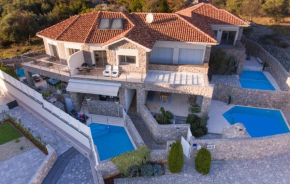 Holiday house with a swimming pool Krk - 23580